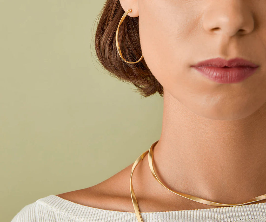 Marrakech: 18K Yellow Gold Twisted Medium Hoop Earrings by Marco Bicego